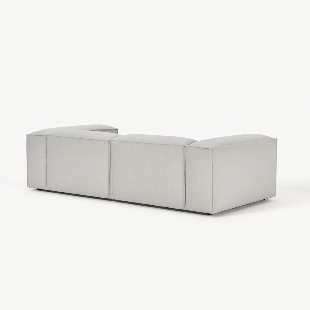 Alpha modular 2 seater sofa with a sleek block design, deep seating comfort, and sharp lines creating a timeless and understated look