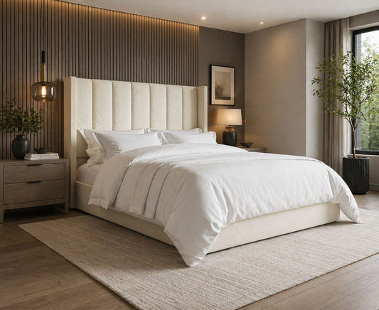 Modern Selvara bed frame featuring structured vertical panels and soft neutral fabric