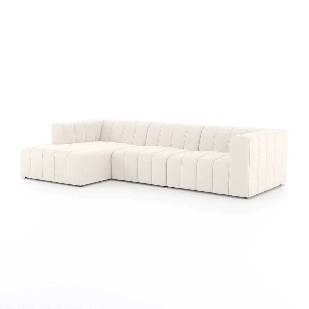 Three seater cream sectional with ottoman