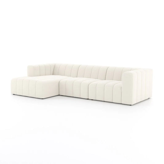 Three seater cream sectional with ottoman