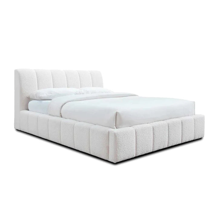 modern upholstered bed with simple headboard and low profile base