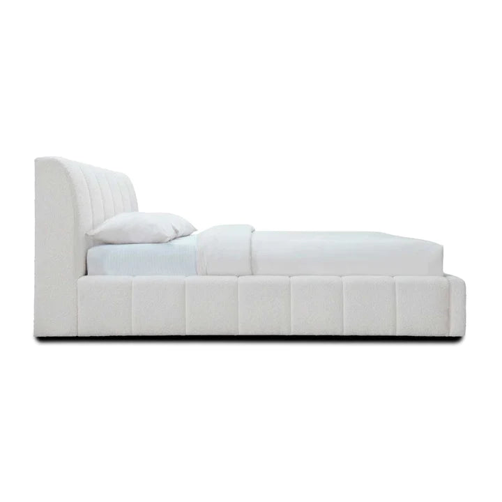 elegant upholstered bed with neutral fabric and clean silhouette