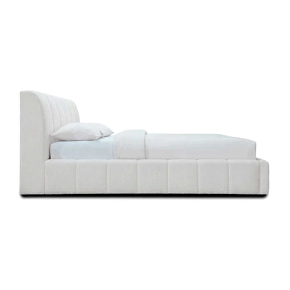 elegant upholstered bed with neutral fabric and clean silhouette