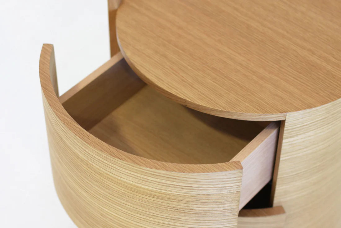 A close-up highlighting the beautifully curved ash oak veneer body, showcasing the natural wood grain and refined craftsmanship.