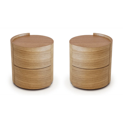 The Alida Bedside Tables are displayed in a clean studio setting on a white background, showcasing their curved ash oak veneer design and elegant proportions.