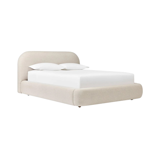 modern upholstered bed with soft fabric and sleek silhouette