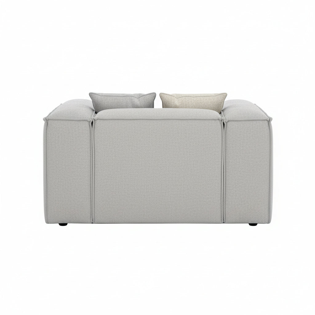 A clean, structured central module designed for seamless integration within modular sofa configurations, offering flexibility and a refined contemporary look.