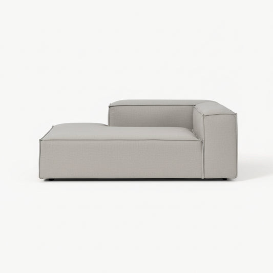 High-end Alpha chaise sofa with minimalist silhouette, plush cushioning, and modular flexibility, designed for stylish and spacious modern interiors