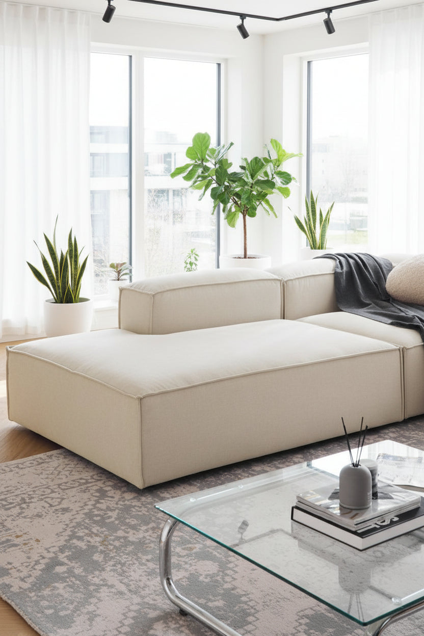 A clean, structured corner chaise designed to extend seating while maintaining a sleek, contemporary modular aesthetic.