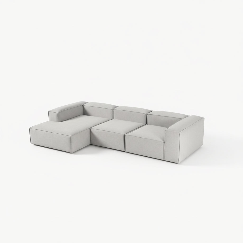 Premium Alpha modular 3 seater L shape sofa featuring a minimalist silhouette, wide seat modules, and tailored upholstery delivering both comfort and architectural style
