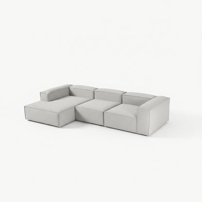 Premium Alpha modular 3 seater L shape sofa featuring a minimalist silhouette, wide seat modules, and tailored upholstery delivering both comfort and architectural style
