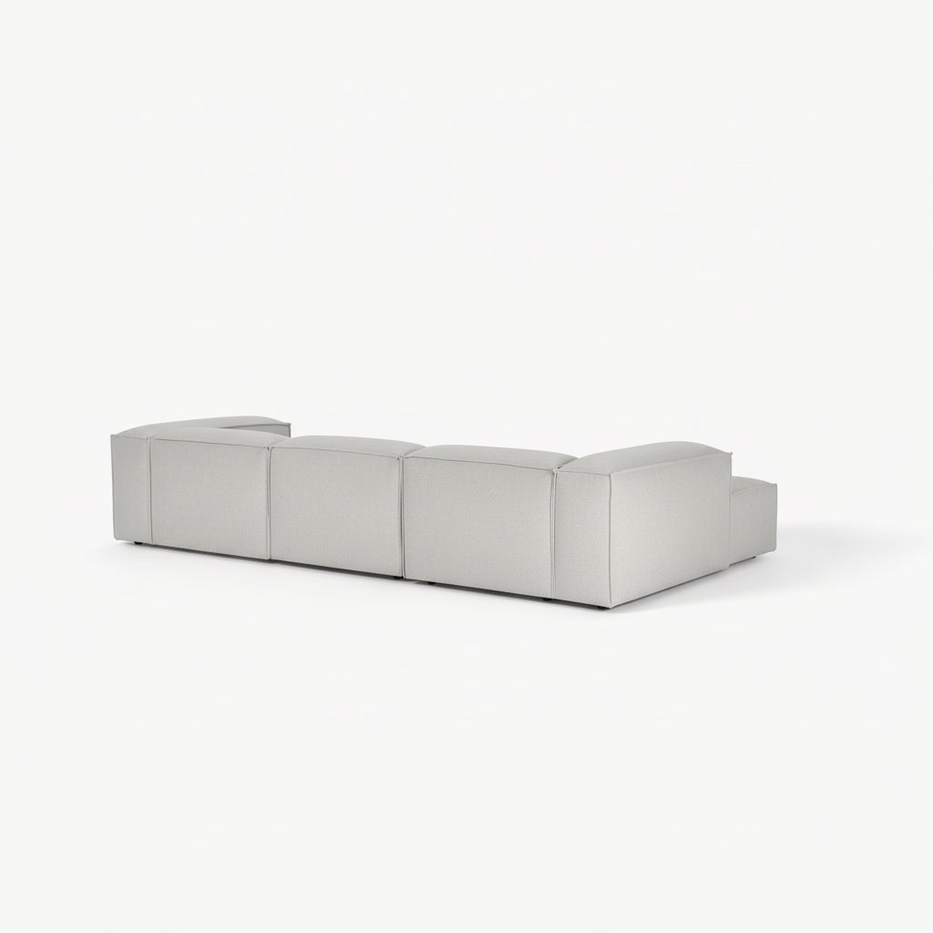 Alpha modular 3 seater L shape sofa with clean block design, smooth upholstery finish, and deep seating creating a sophisticated and timeless interior look
