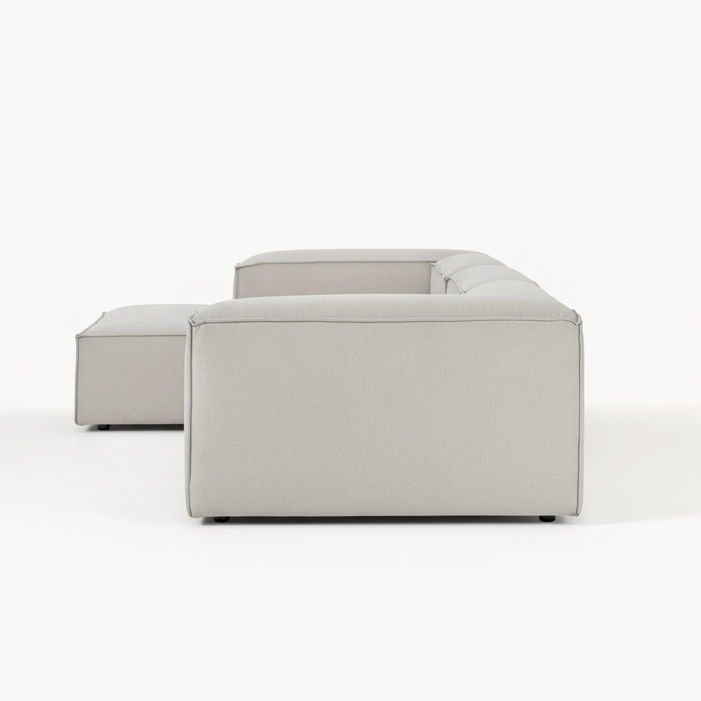 Premium Alpha modular L shape sofa designed with versatile seating modules, soft fabric upholstery, and a contemporary structure perfect for luxury interiors
