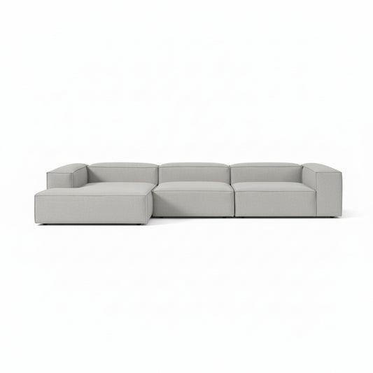 Luxury Alpha modular 3 seater L shape sofa with extended chaise design, deep structured seating, and premium neutral upholstery crafted for modern open-plan living spaces
