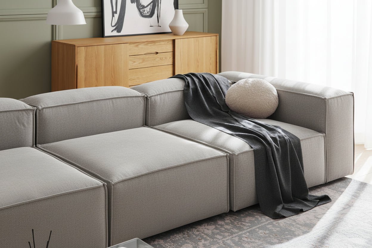 Alpha modular armless unit with a low-profile design and squared shape, ideal as a standalone piece or part of a larger configuration
