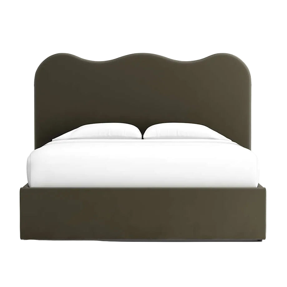modern bed with scalloped headboard and clean upholstered base