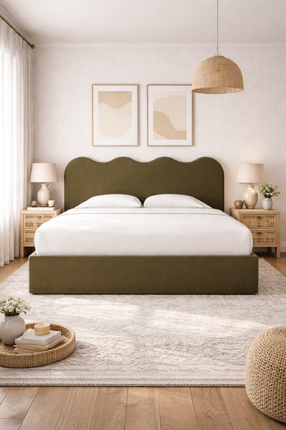 luxury upholstered bed with scalloped headboard and soft curved design