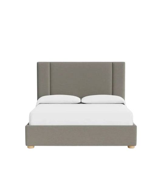 Front view of Ashton bed featuring soft padded headboard panels and minimalist base