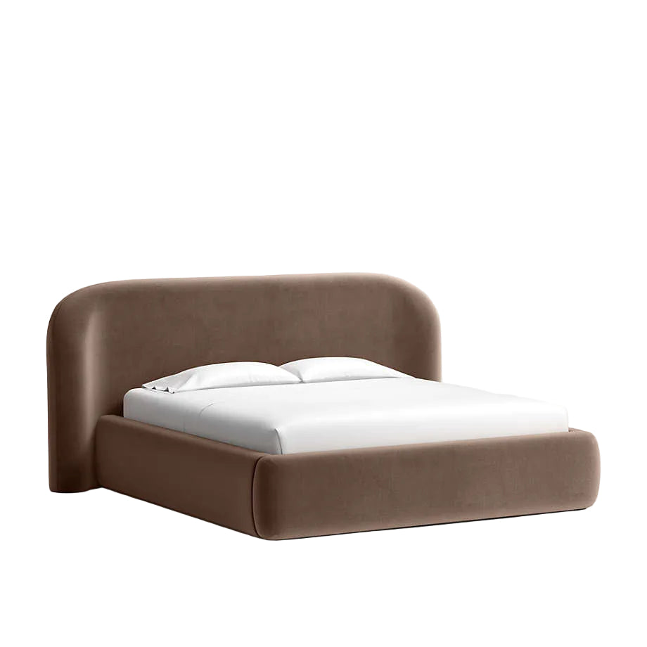 contemporary bed with curved headboard creating a cocooning effect