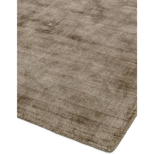 An angled studio shot showcasing the Avoria Rug’s 100% wool hand woven pattern, subtle tonal variation, and natural artisanal texture on a clean white background.