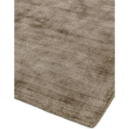 An angled studio shot showcasing the Avoria Rug’s 100% wool hand woven pattern, subtle tonal variation, and natural artisanal texture on a clean white background.