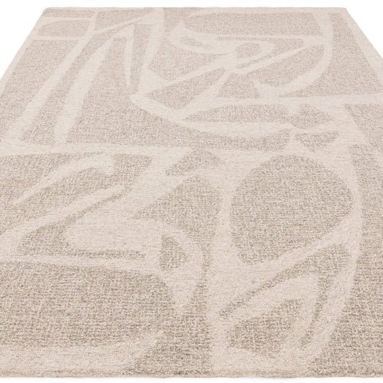 A detailed macro shot of the Bellara Rug showcasing its 100% wool fibres, soft pile structure, and rich tactile weave against a pure white studio background.