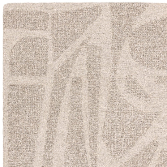 This image highlights the refined edge finishing and binding of the Bellara Rug, made from 100% wool, captured on a white background to emphasize craftsmanship precision.
