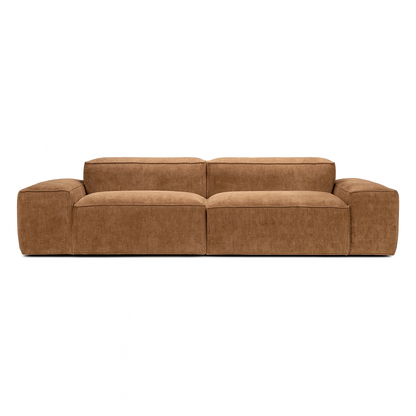 brown modular 2 seater sofa with oversized xl arms in a warm contemporary living room setting
