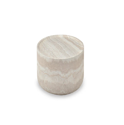 The Cilantro Side Table is shown in a full studio view on a clean white background, highlighting its rounded sculptural form and faux travertine finish.