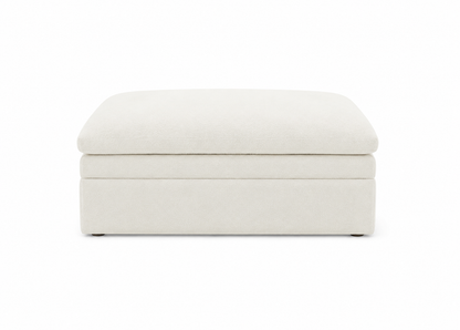 White storage ottoman on a white background