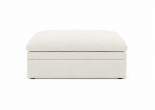 White storage ottoman on a white background