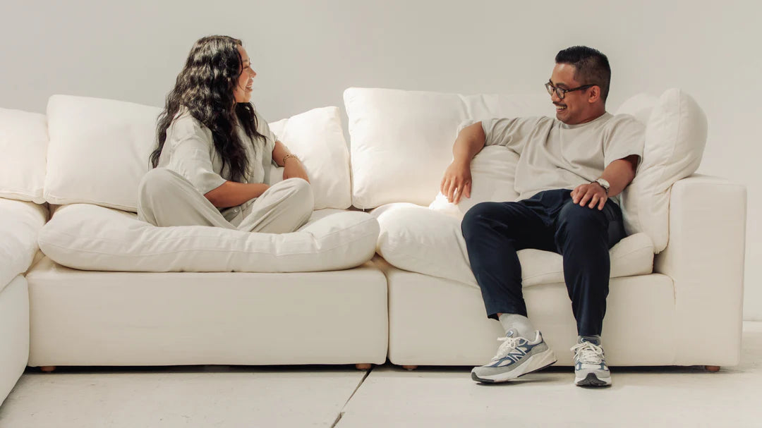 Cloud modular sofa styled in a contemporary interior with wide seating and footstools