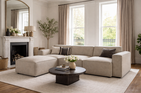 modern modular sofa with chaise lounge and deep seating cushions in neutral tone
