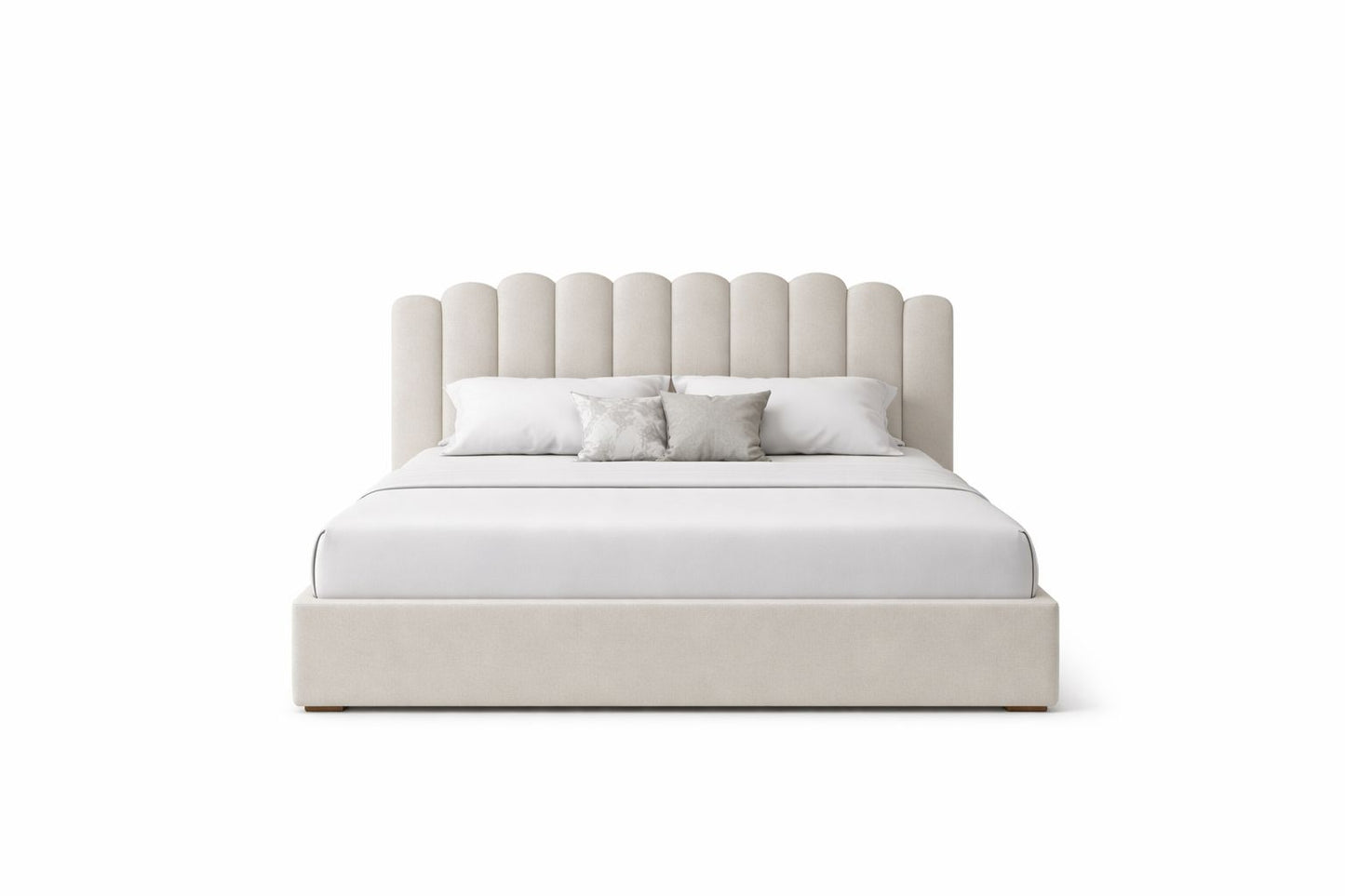 cozy upholstered bed with scalloped cushioned headboard and padded base