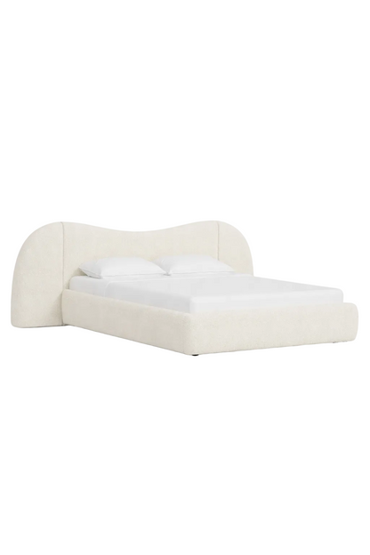 Elegant wraparound headboard with plush upholstery and refined finish