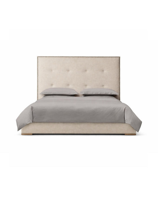 Softly detailed headboard with subtle buttoned elegance
