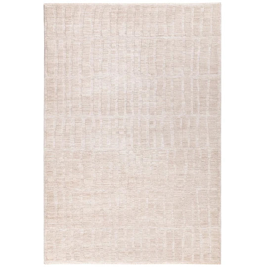 The Fiora Rug is shown in a full top-down studio view on a clean white background, highlighting its 100% wool construction, soft beige-natural tone, and subtle tonal space-dyed design.