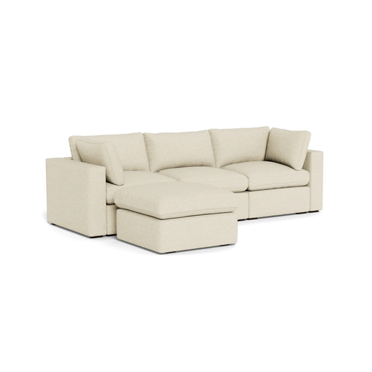 three seater modular sofa with matching ottoman for extended comfort
