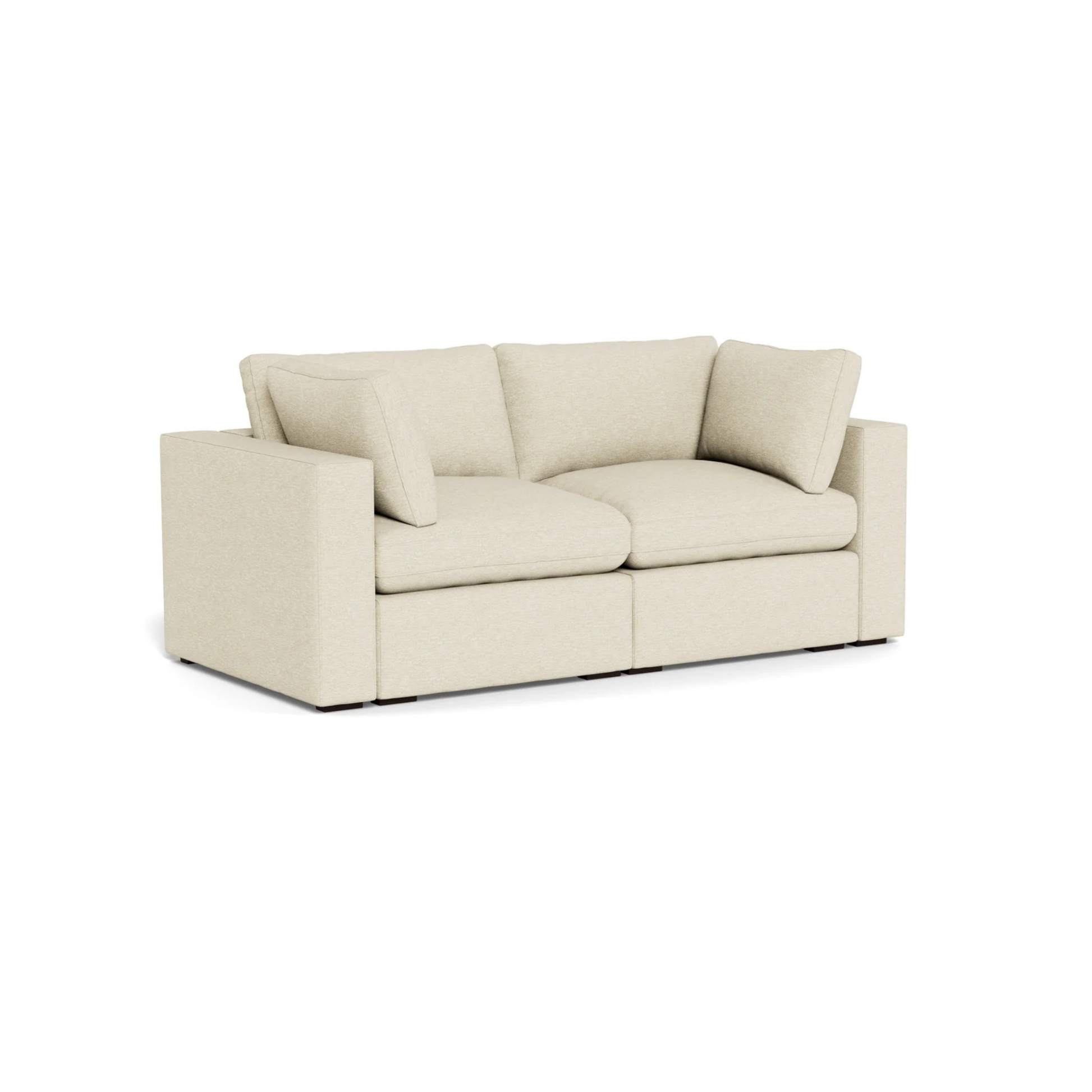 modern two seater modular sofa with deep cushions and clean lines
