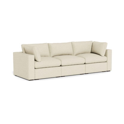 modern three seater sofa with deep cushions and clean lines
