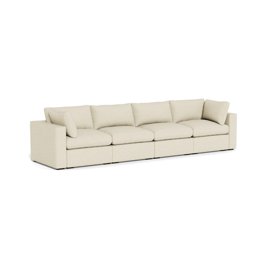 spacious four seater modular sofa with deep cushions and modern silhouette
