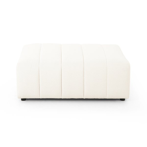 A white upholstered Kona Footstool with a sleek, modern design and hidden feet.
