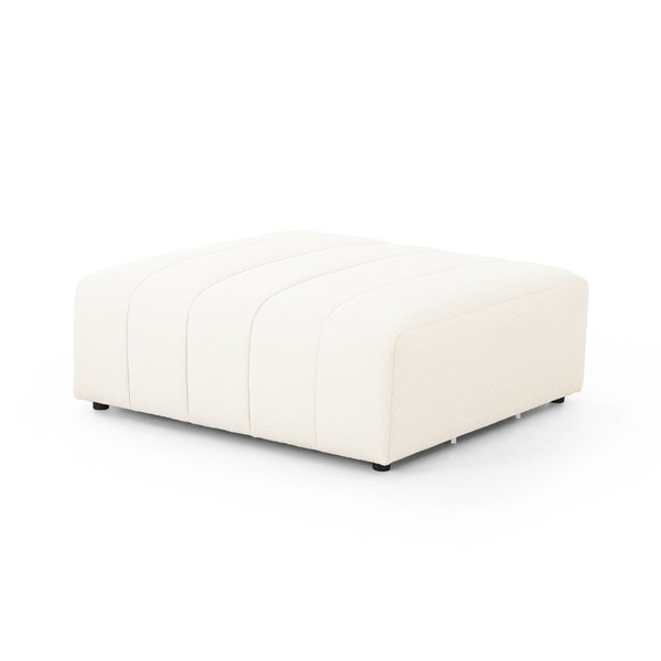 A white upholstered Kona Ottoman with a sleek, modern design and hidden feet.