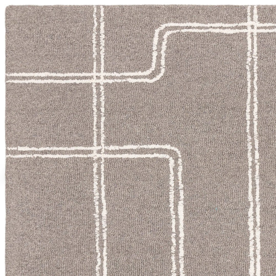 The large Astoria Rug styled in an open-plan interior, demonstrating its versatile design and ability to elevate both classic and modern homes.