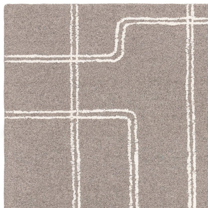 The large Astoria Rug styled in an open-plan interior, demonstrating its versatile design and ability to elevate both classic and modern homes.