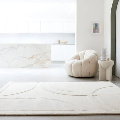 A detailed macro shot showcasing the premium 100% New Zealand wool fibres, emphasizing softness, natural texture, and subtle surface variation on a white background.
