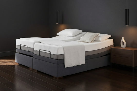 Minimalist adjustable bed base with split mattress support and ergonomic elevation controls