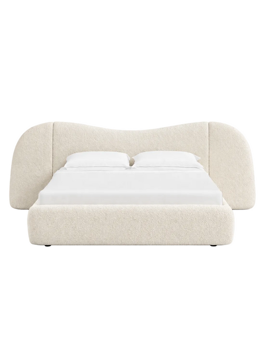 Soft curved headboard with a clean, low-profile luxury frame

