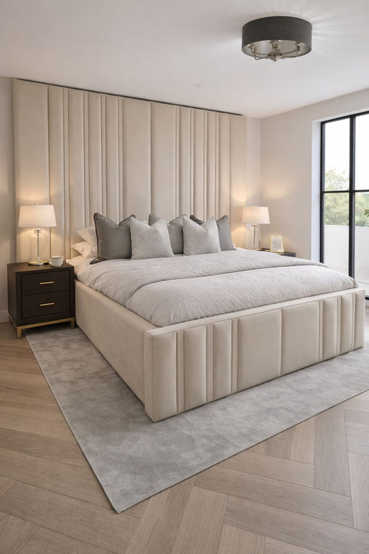 Tall structured headboard with soft cushioning and refined 