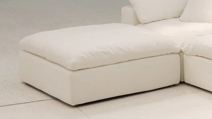 footstool designed to integrate with modular sofa sections for added comfort and versatility